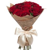 Гарний букет червоних троянд в папері