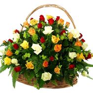 Basket with different color roses