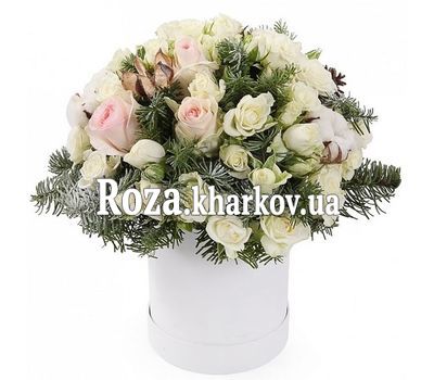 Christmas box with flowers and spruce